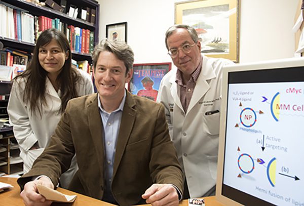 Researchers at Washington University School of Medicine in St. Louis have developed a nanotherapy that is effective in treating mice with multiple myeloma, a cancer of bone marrow immune cells. From left are first author Deepti Sood Gupta, PhD, and co-senior authors Michael H. Tomasson, MD, and Gregory M. Lanza, MD, PhD. (Photo: Robert Boston)