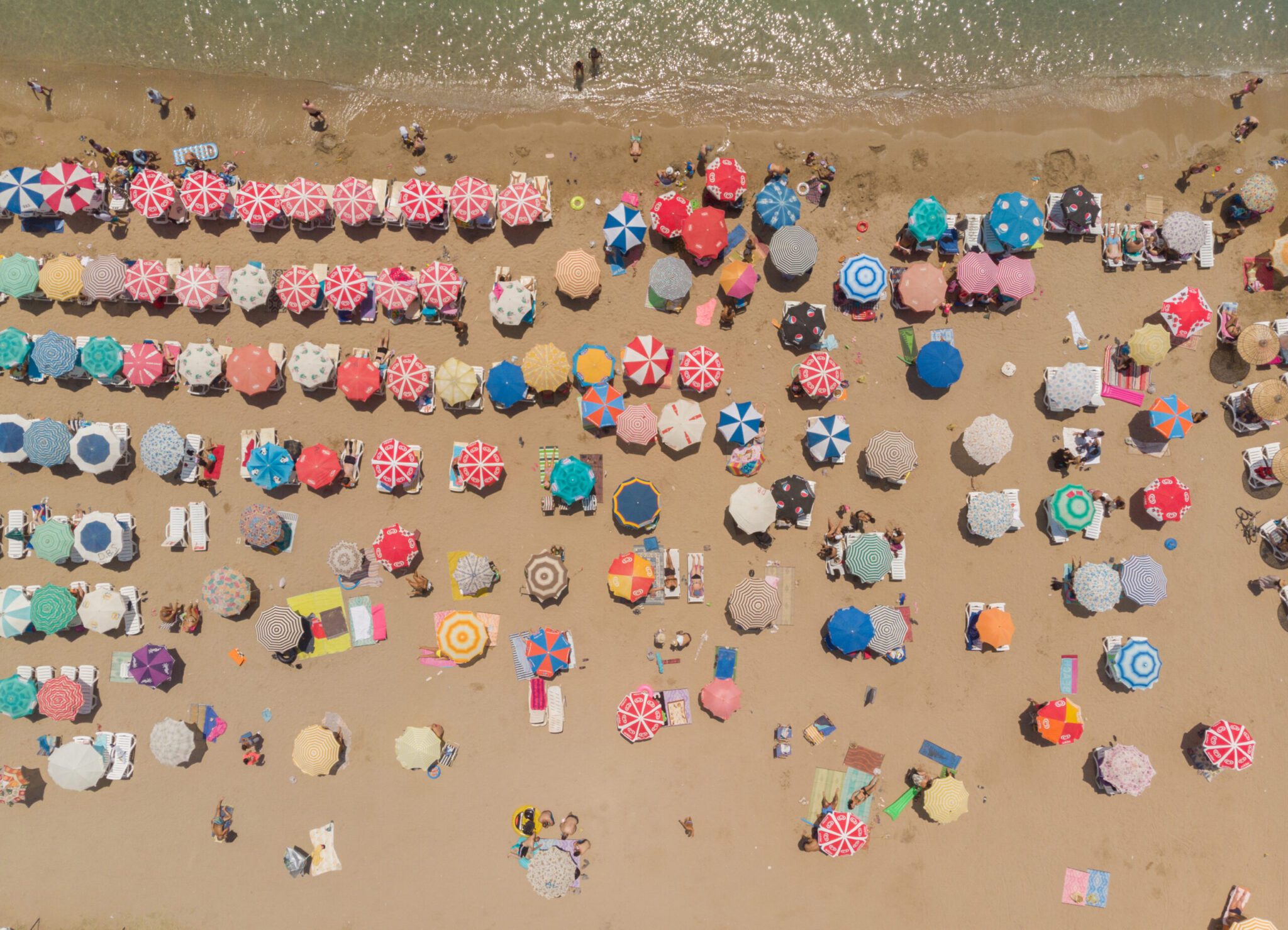 Aerial View Of Umbrellas In A Beach
